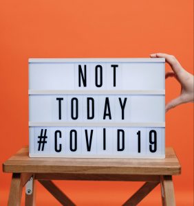 not-today-covid19-sign-on-wooden-stool-3952231